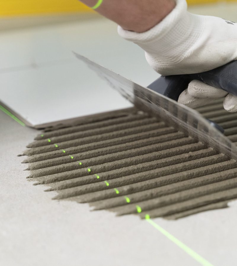 tiler-working-renovation-apartment